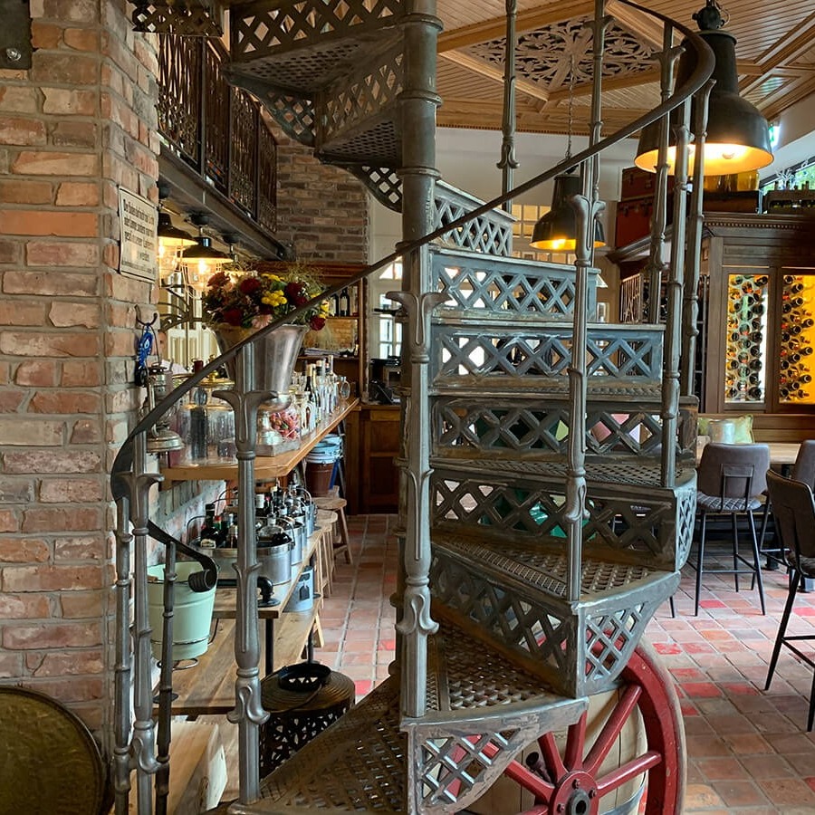 Cast iron spiral staircase model Tours in Restaurant A´Mura in Hannover (Germany)