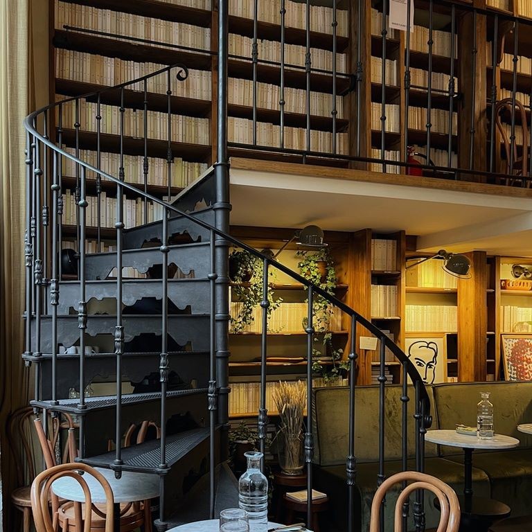 Cast iron spiral staircase model Versailles in the Cafe Maison Fleuret, 75007 Paris